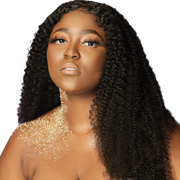 Woman with long, curly black hair and gold glitter on shoulders against a white background
